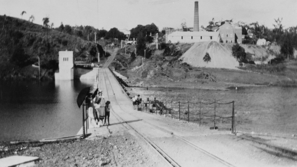 An historical photograph, taken circa 1947, showing the pumping station complex’s intake tower, weir, the 1899 bridge remains, and the 1941 fish ladder